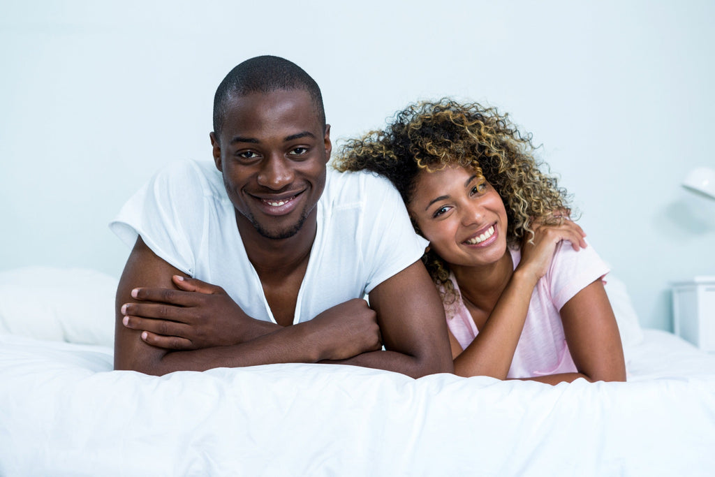 couple on bamboo sheets