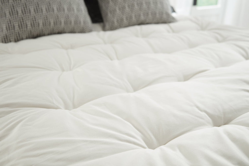 Guide to Cleaning Your Bedding - PlushBeds