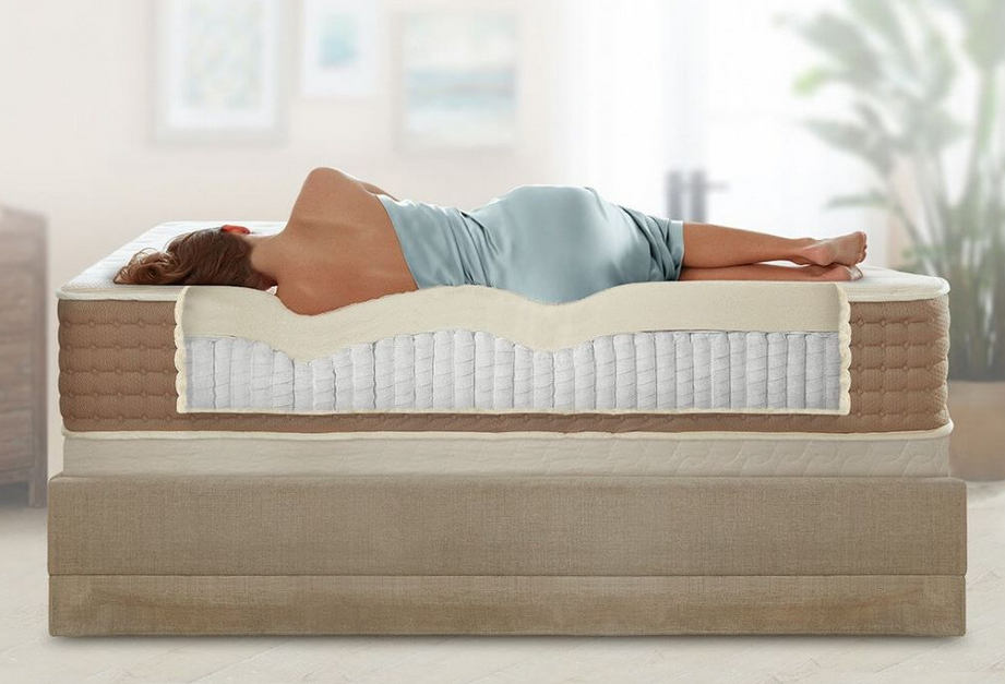 woman sleeping on a latex mattress topper
