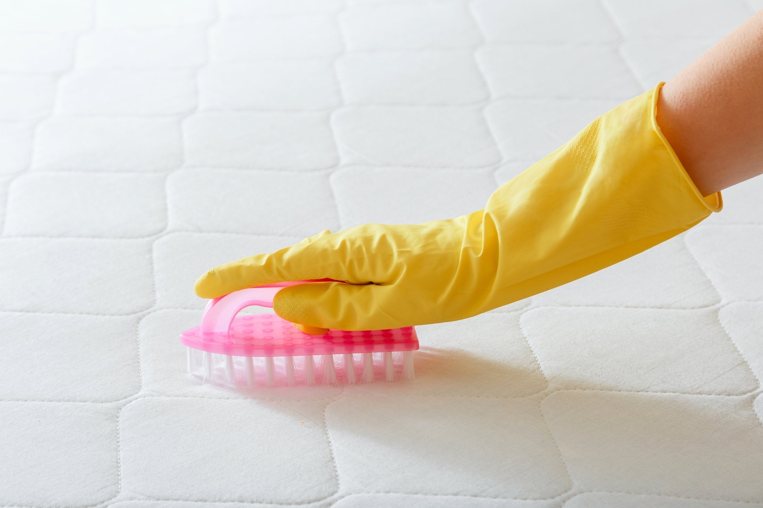 washing a wool topper