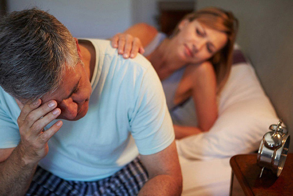 man experiencing insomnia