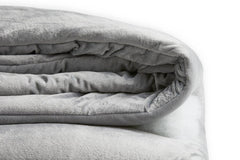 Bask in the Cozy, Welcoming Warmth of PlushBeds Blankets | PlushBeds